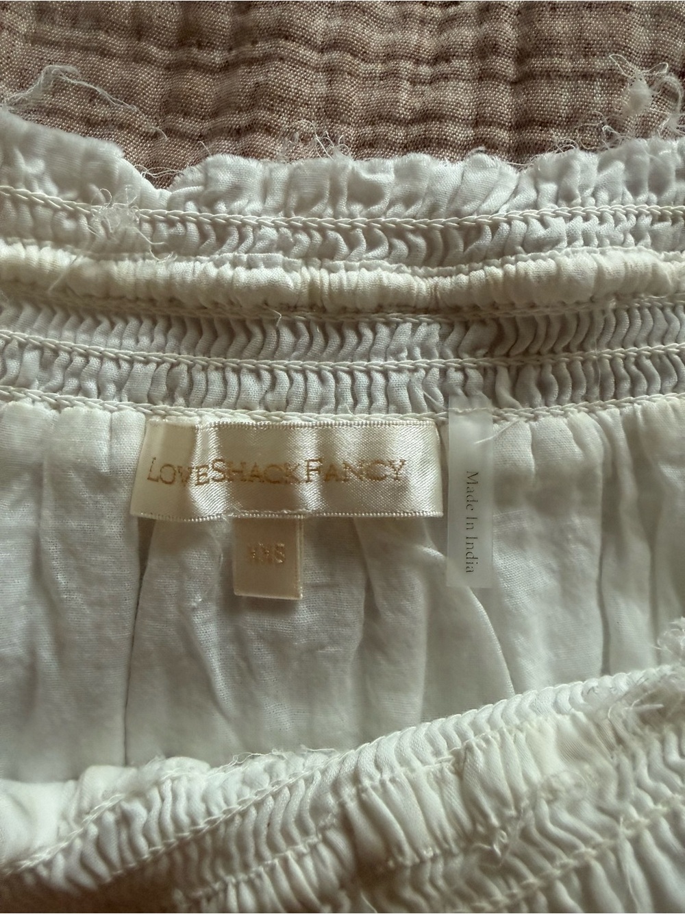LoveShackFancy White Eyelet Tiered Mini Skirt with Tassel Detail - Picture 2 of 4